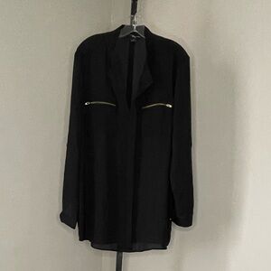 Black sexy shirt. Tab sleeves. Can be worn up or down. Gold zippers and buttons.
